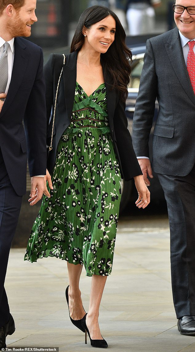 Meghan wore his £300 green floral midi dress to the Invictus Games reception in 2018