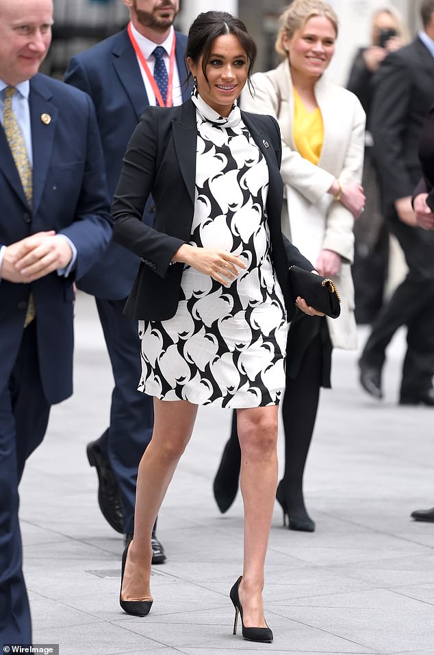 Meghan's £185 black-and-white Reiss Azzura dress on International Women's Day in 2019 didn't cause the same stir