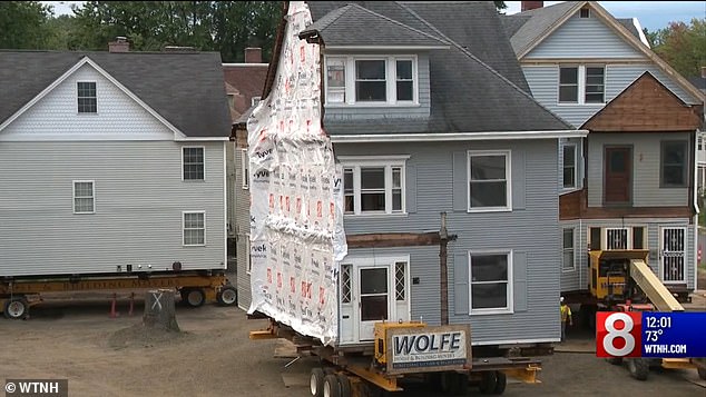 One house even had to be sawn in half to be moved