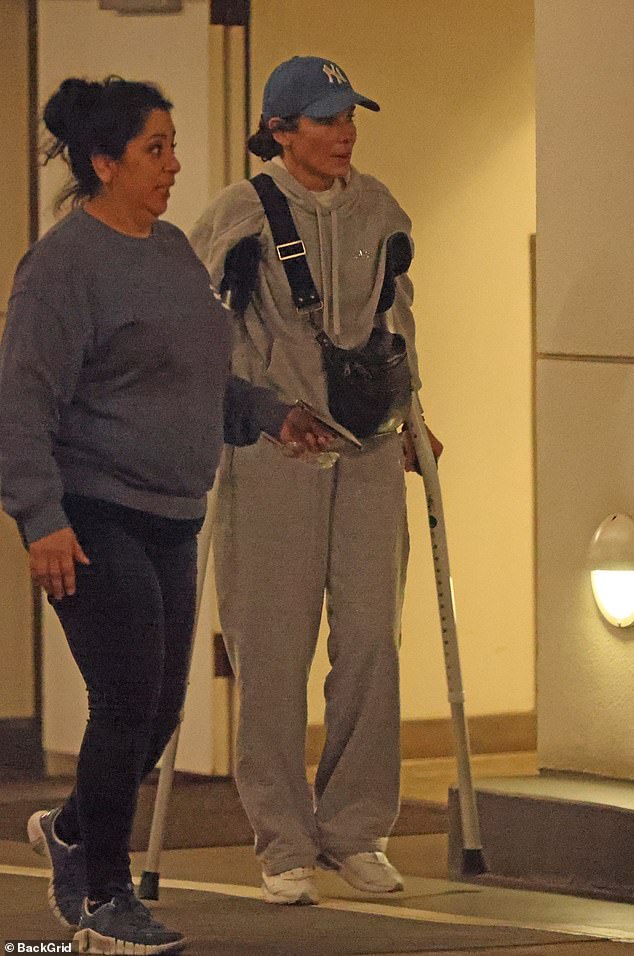 She walked cautiously on crutches and was recovering from an injury that has not yet been disclosed.