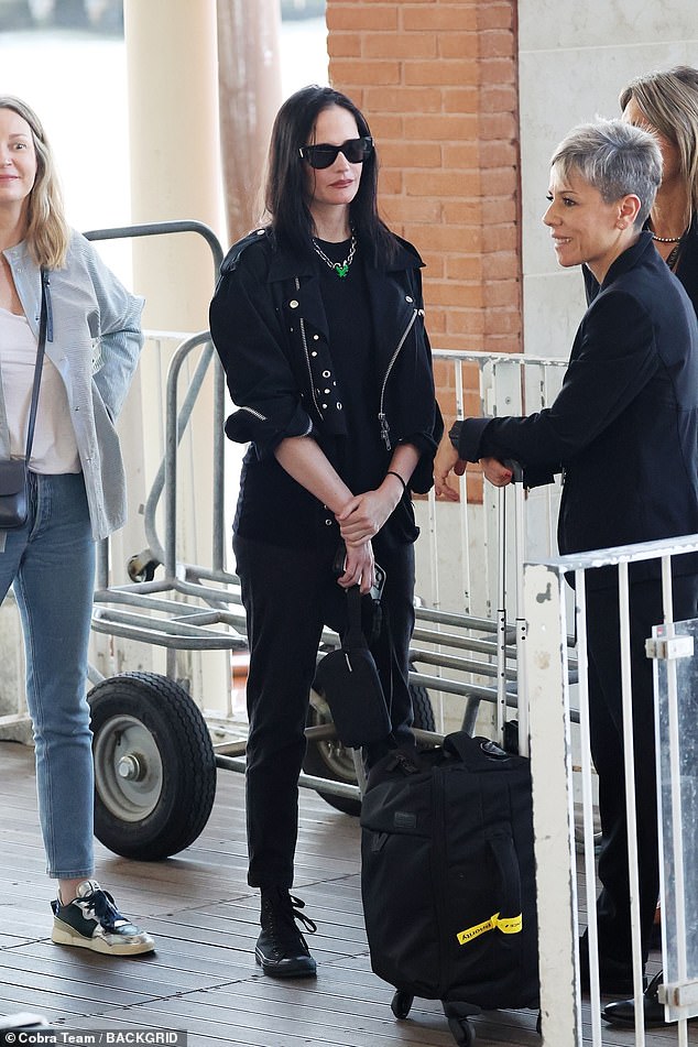 The Casino Royale star opted for an all-black ensemble despite the sunny weather, as she let her black hair fall loosely over her shoulders