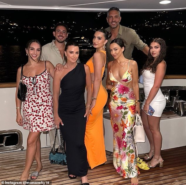 In July 2023, Realtor LLC filed a complaint alleging violation of the federal False Claims Act by The Agency (pictured is Kyle and Mauricio's family on a boat during a vacation)