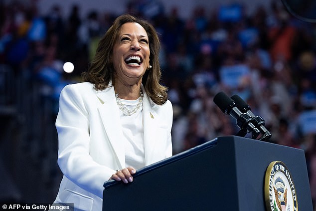 Kamala Harris speaks at a campaign rally at Enmarket Arena during a two-day campaign bus tour in Savannah, Georgia