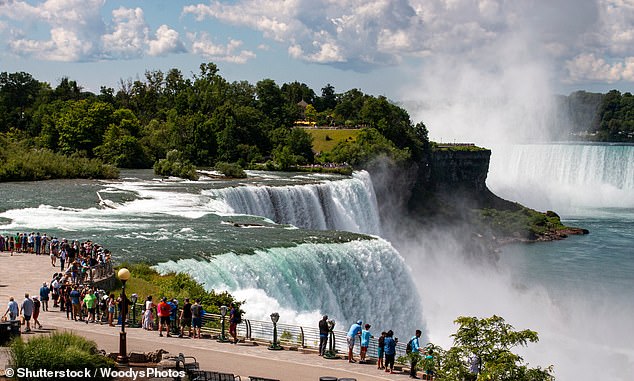 Above, tourists admire the waterfalls of Niagara Falls State Park