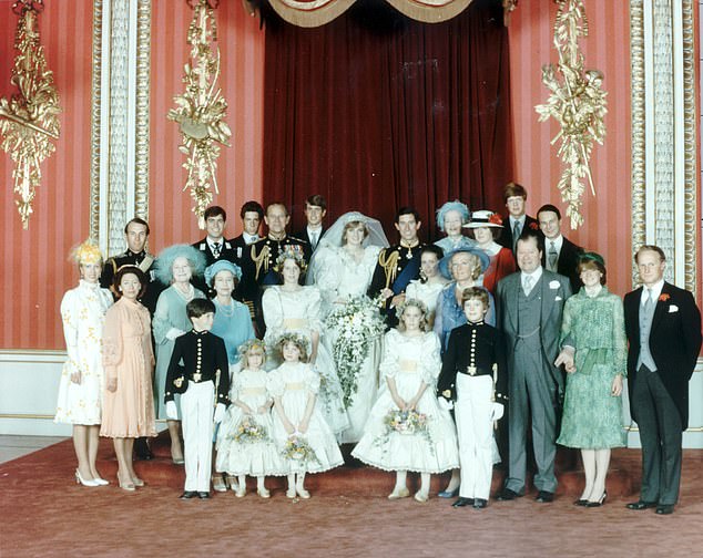 Lord Fellowes is pictured (back right) at the wedding of Prince Charles and Diana in 1981