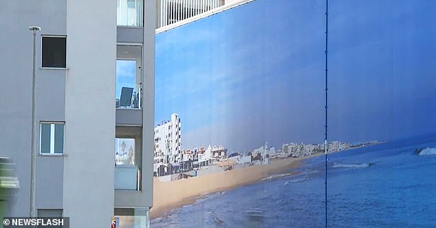 Photo shows the giant canvas that replaces the sea view in Torrevieja, Spain, undated