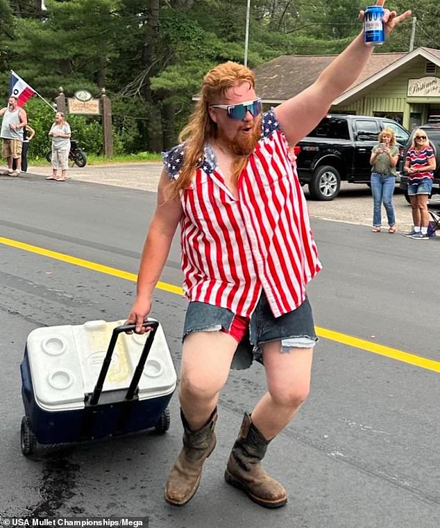 USA Mullet Championships 2024 "Mane Event" finalist Nathan Lofy of Sayner, Wisconsin, with his mullet "Ginga J"