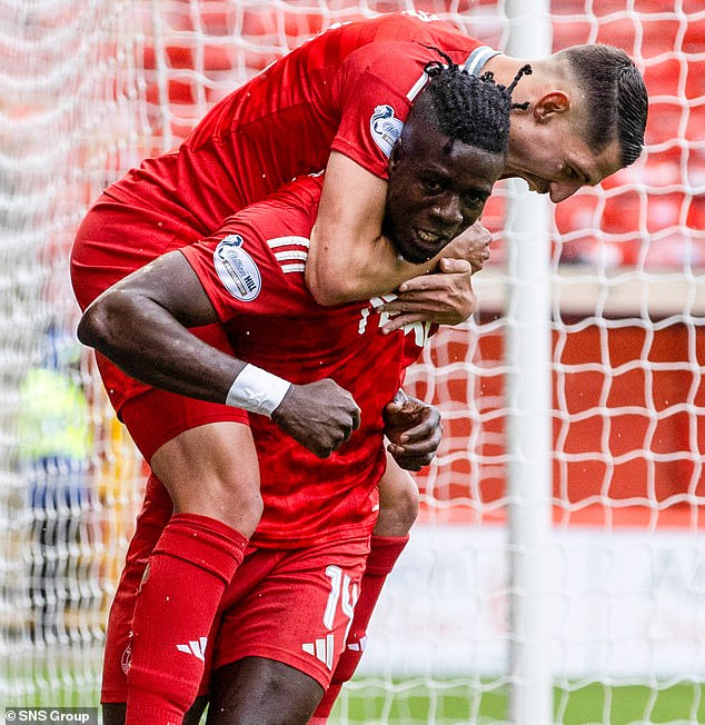 Pope Habib Gueye celebrates his goal against Kilmarnock last weekend with Ester Sokler