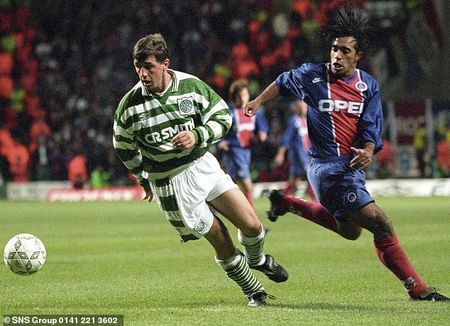 The defender is shadowed by PSG star Patrice Loko during a UEFA Cup match