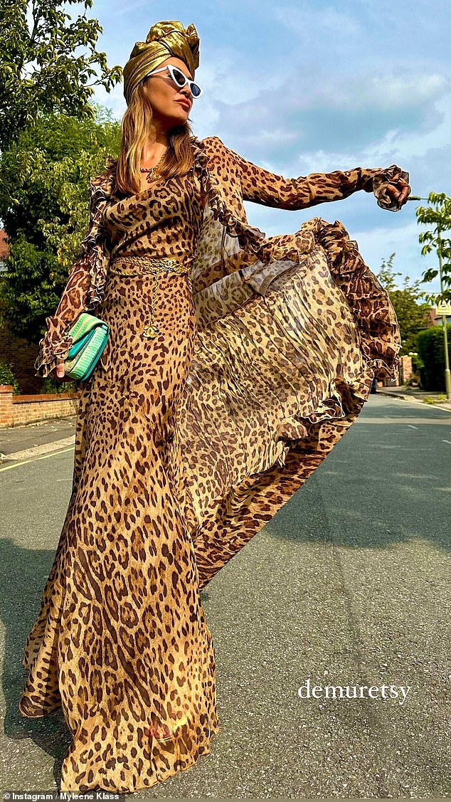 The former Hear'Say singer, 46, exuded confidence in a leopard print maxi dress as she showed off her enviable figure and playfully posed for photos