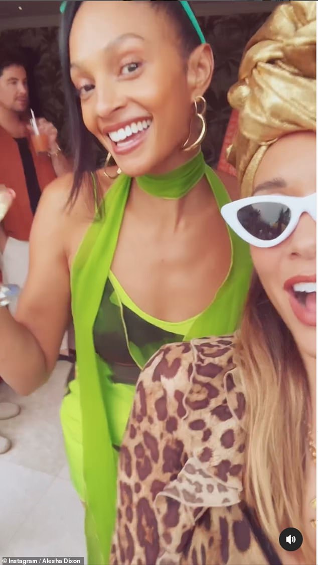 Alesha let everyone know she was enjoying her summer routine as she turned up to the party in a green dress with a long tie, statement earrings and green sunglasses.