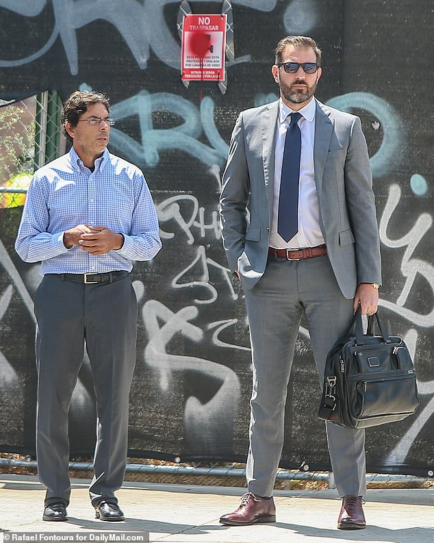 Chavez and his attorney Matthew C. Binninger outside the federal courthouse on Friday