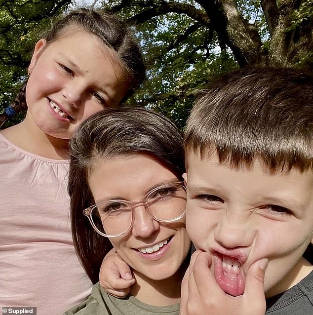 His wife Larissa, pictured here with their daughter Matilda and son Hamish, remembers the tough times well - having to count the groceries at the till. This was when her daughter was a newborn