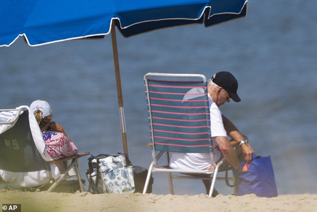 The outspoken Republican, 50, shared footage of Biden lounging on the beach taken on August 28