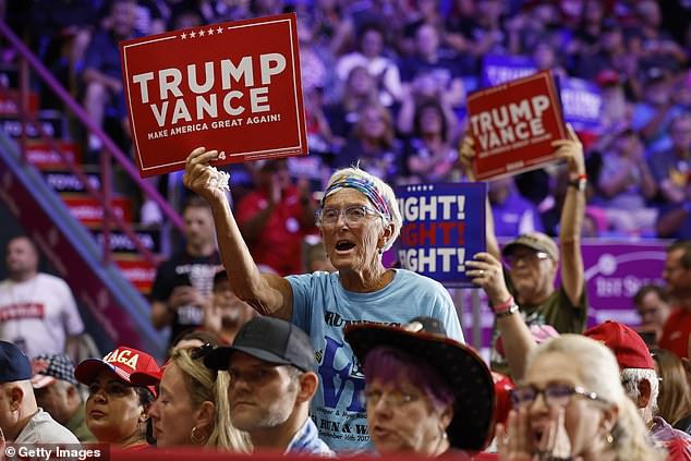 Supporters cheer for the Republican presidential candidate during a campaign rally at the 1st Summit Arena at the Cambria County War Memorial on August 30