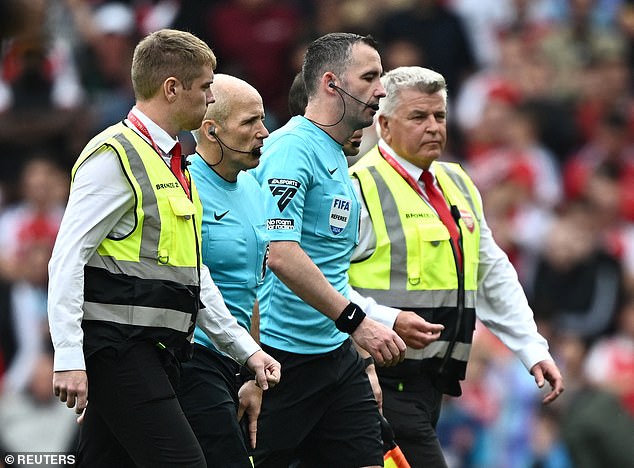 Referee Kavanagh was escorted off the pitch by security personnel after the final whistle on Saturday