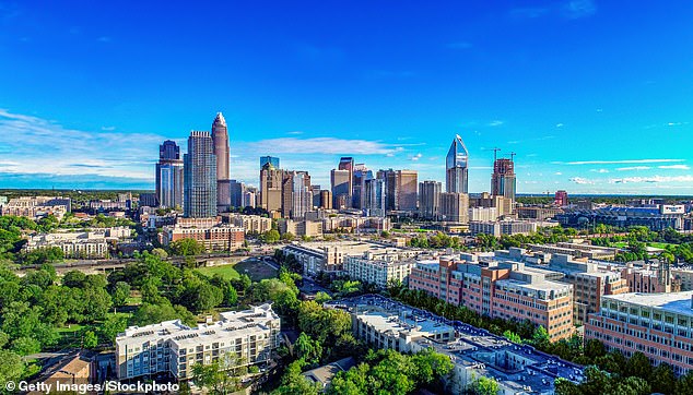 North Carolina is a hotspot for potential buyers because of its relative affordability, with an average cost of living of $43,959 per year. (Pictured: Charlotte, North Carolina)