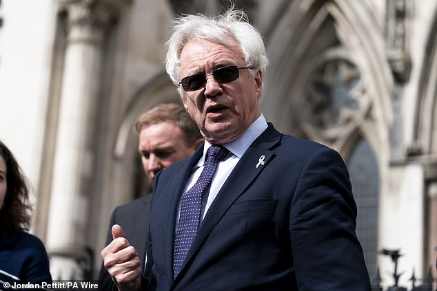 David Davis MP speaks to media outside the Royal Courts Of Justice in London in March