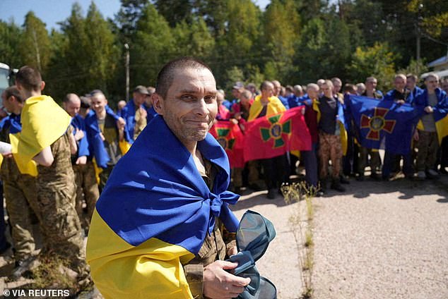 A Ukrainian prisoner of war reacts after an exchange amid the Russian attack on Ukraine