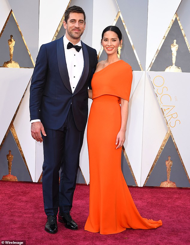 Olivia Munn and Aaron Rodgers arrive at the 88th Annual Academy Awards