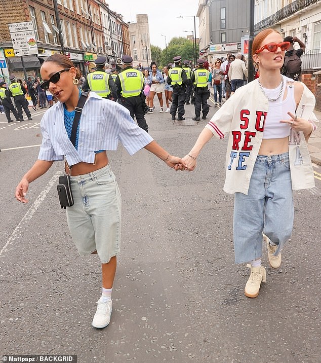 Alex Scott and Jess Glynne put on a loving show as they enjoyed Notting Hill Carnival in London on Monday