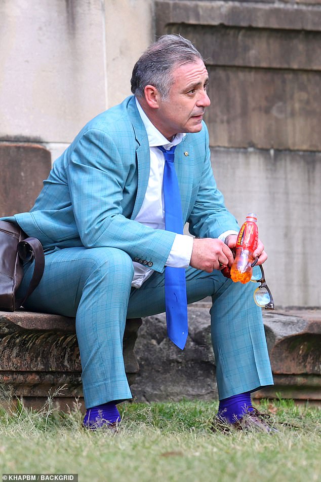 The fallen star sipped a sparkling Lucozade as he stared into the distance