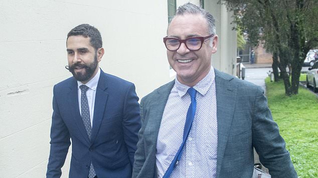 Andrew O'Keefe smiled for the waiting cameras as he left Waverley Crown Court on Thursday. Photo: NewsWire/Jeremy Piper