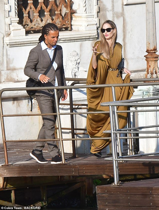 Angelina Jolie has sparked rumours of a romance with British rapper Akala after the duo were spotted leaving a hotel in Venice together