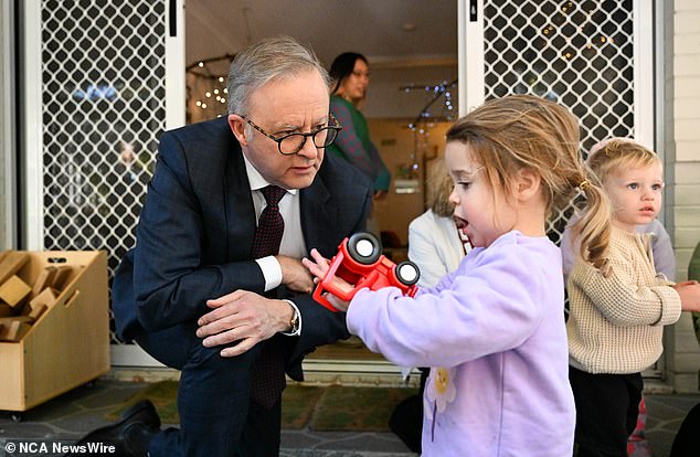 Premier Anthony Albanese says the pay rise would ensure fair pay for childcare workers, a vital sector. He is pictured at a childcare centre in Brisbane last month