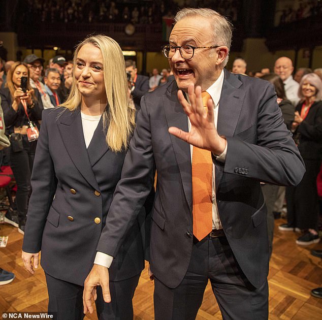 Commentators were furious with Mr Albanese (pictured with his fiancée Jodie Haydon) for taking the cost of living crisis 'lightly'