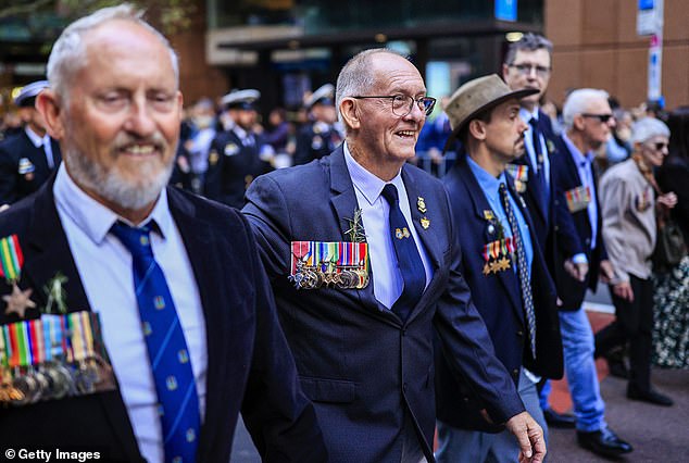 Pokie machines could be closed on Anzac Day under Alex Greenwich's proposal. Pictured are veterans on Anzac Day