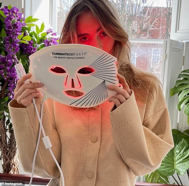 English singer-songwriter and actress Suki Waterhouse is pictured wearing her LED light mask