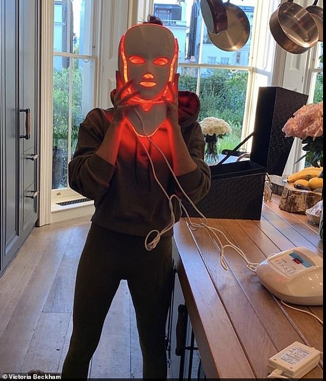 Victoria Beckham with her mask. The non-invasive treatment combines red and near-infrared light, the two wavelengths work beneath the skin's surface to stimulate the natural rejuvenation process