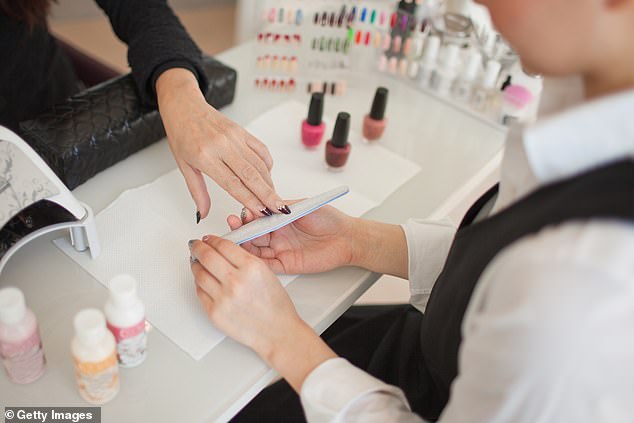 To find out what a reasonable price is for elaborate nail art in a big city, and how customers can avoid sticker shock, FEMAIL consulted three well-known nail stylists (stock image)