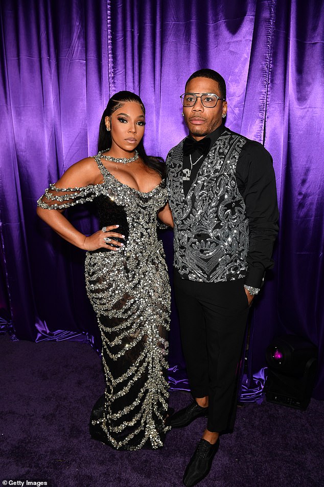 Ashanti, 43, opened up with her husband Nelly, 49, on Wednesday about the meaning of her newborn son's name - Kareem Kenkaide 'KK' Haynes. Pictured in Atlanta in June