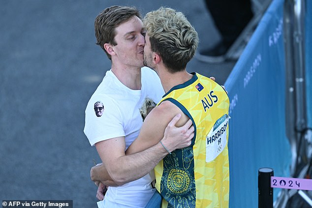 Campbell Harrison kisses his boyfriend Justin after his semi-final in Paris