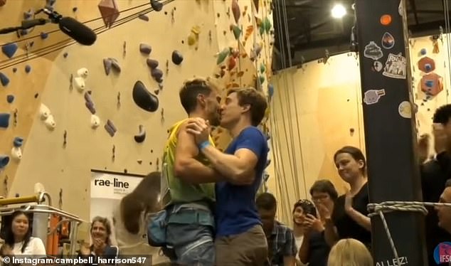 Australian sports climber Campbell Harrison has been criticised after a photo of him kissing his boyfriend Justin as he celebrated making the Australian team for the Paris Olympics went viral