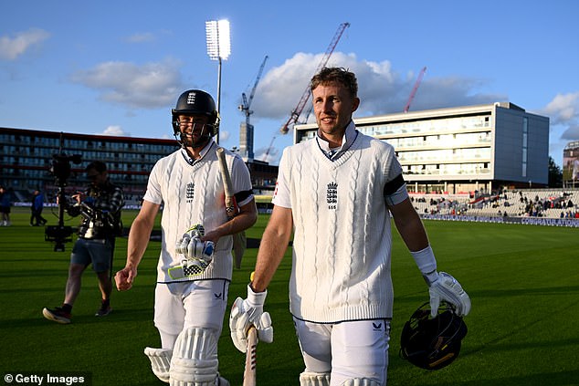 Joe Root (right) hit an unbeaten 62 as England beat Sri Lanka by five wickets in the first Test