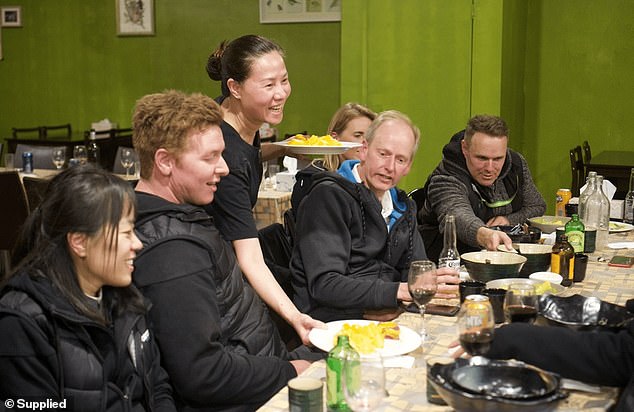 Hue, 54, (pictured serving customers) was sponsored to become a chef at a Vietnamese restaurant in Bathurst, NSW in January 2015