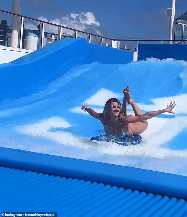 Bikini-wearing Ashley Roberts was blown away by a powerful jet of water in a hilarious surfing simulator clip posted to Instagram on Thursday