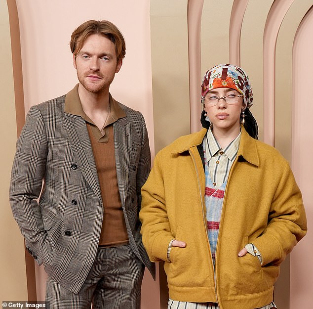 Billie Eilish's brother Finneas defended her against a TikToker who called her verse on the Charli XCX song Guess 'predatory'; pictured in February