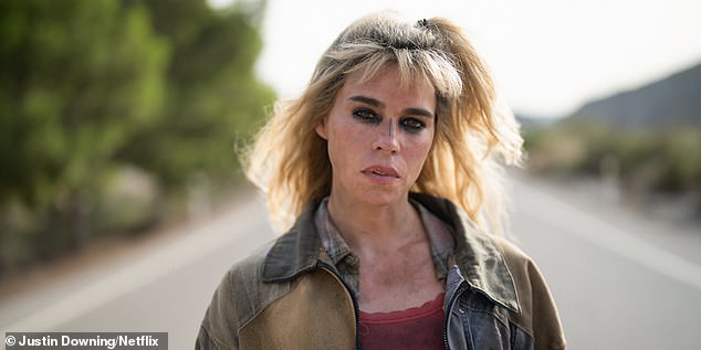 Billie Piper, 41, looked worlds apart from her usual glamorous self when she made her debut in a new trailer for upcoming Netflix series KAOS