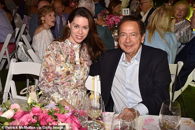 Billionaire hedge fund manager John Paulson's pregnant fiancée, registered dietitian Alina de Almeida (left), is facing backlash from his estranged wife, Jenny Paulson, over her potential claim to a share of his $5.1 billion fortune