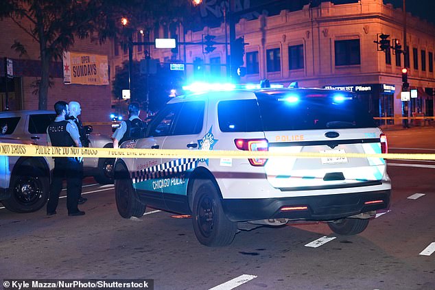 Chicago was plagued by crime over the weekend, with at least 11 people shot in the city, including the death of a man killed by police on Sunday (photo)