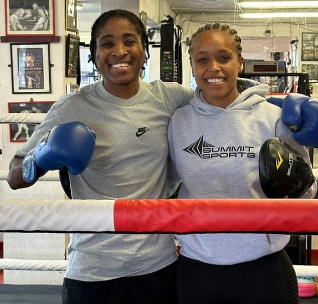 Ngamba pictured with Natasha Jonas after sparring during her training for the Olympic Games