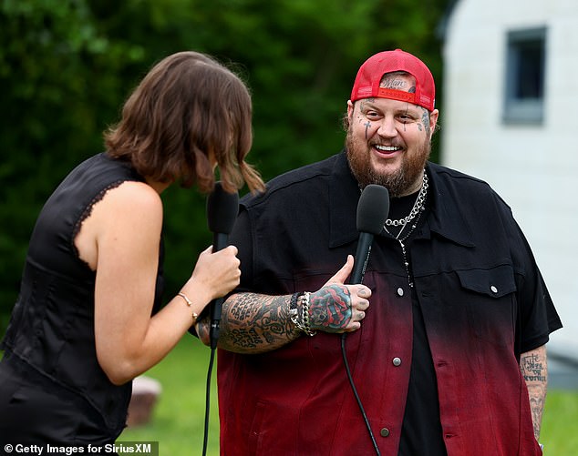 Singer and rapper Jelly Roll, 39, wore a black and red ombre vest