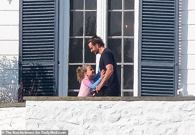 Bradley Cooper, 49, was joined by his daughter Lea, seven, as the couple spent time at Taylor Swift's lavish $17 million Rhode Island mansion on Saturday