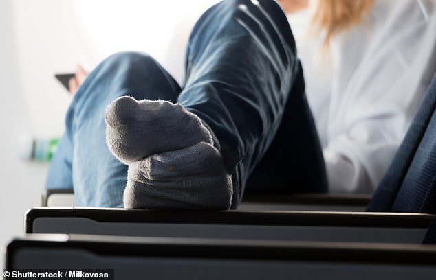 A flight attendant advises against going to the toilet without shoes on, because 'nine times out of ten there is no water on the floor'