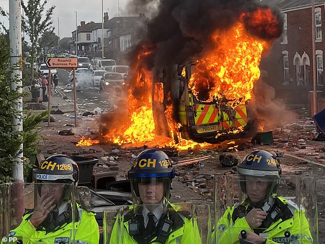 A police van was set on fire outside a mosque in Southport on Tuesday evening as rioting broke out