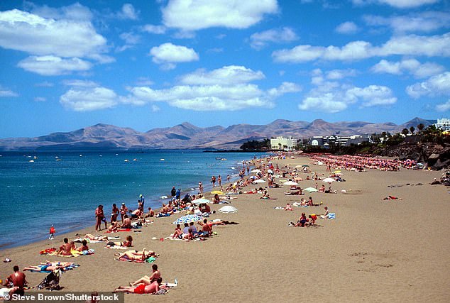 The 59-year-old was treated by emergency services after getting into difficulty in a small sandy cove called Playa Chica in the tourist resort of Puerto del Carmen